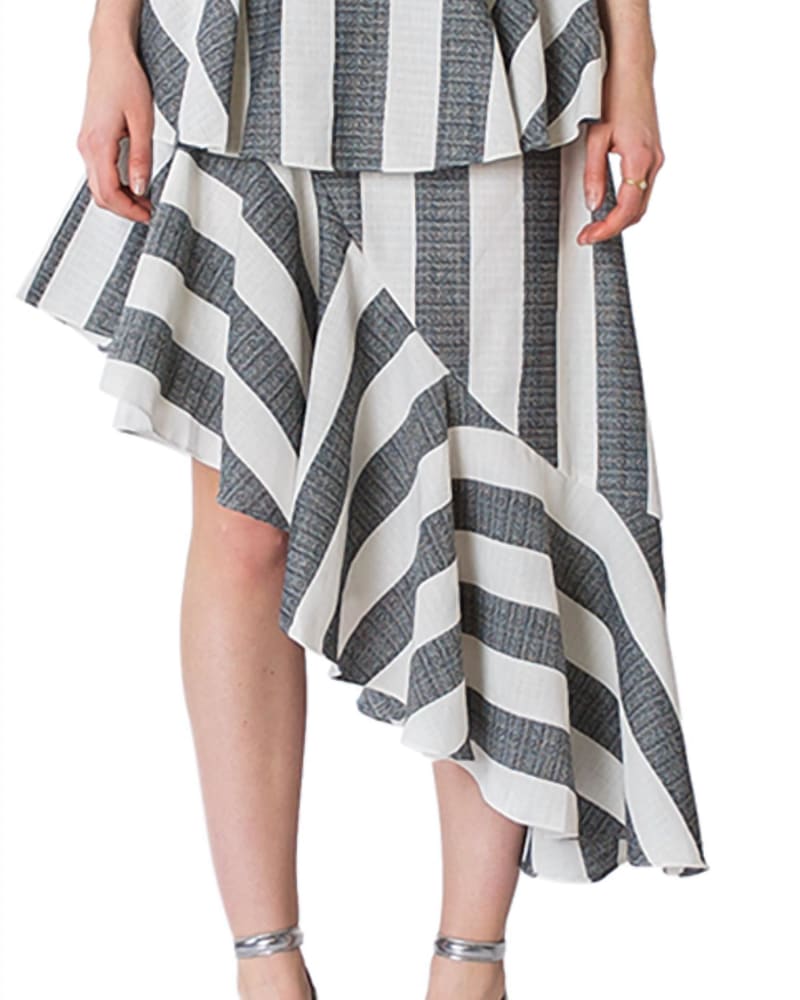 Front of a model wearing a size L Echo Ruffle Skirt in Navy & White in Navy & White by MLM. | dia_product_style_image_id:343309